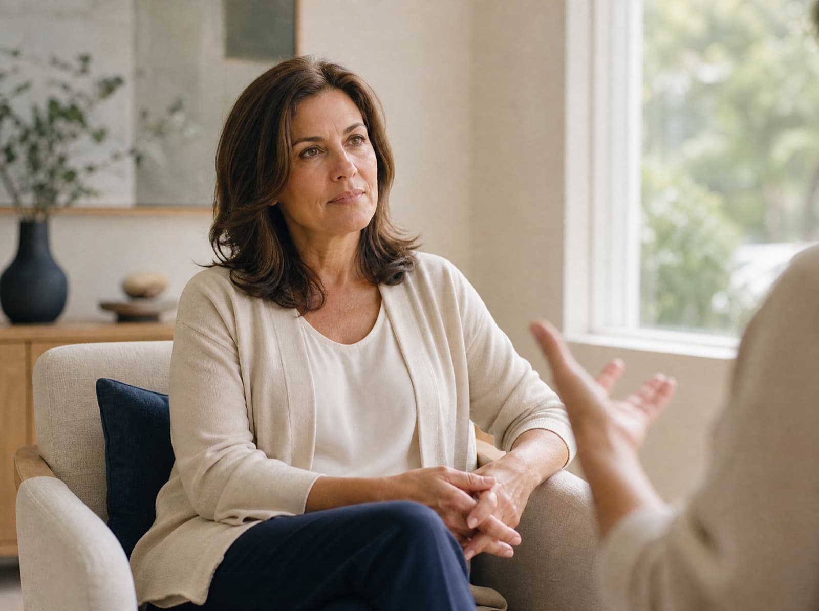 A patient listening during a consultation about treatment areas